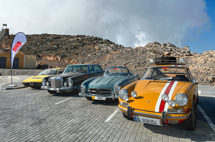 Jacky Ickx’s Bahama Mama and a 300SL after a climb to Jabel Jais - the highest peak in the UAE at 1500m above sea level.